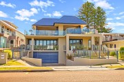 Front of building – penthouse occupies entire upper level!